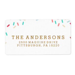 LE BEIGNET ARROSE L'ÉTIQUETTE DE ADRESSE DE RETOU