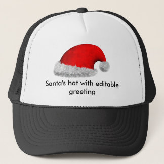 Le casquette de Père Noël avec la salutation
