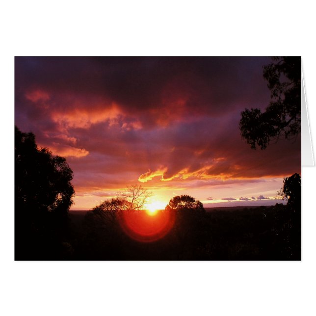 Le coucher du soleil regarde la carte (Devant horizontal)