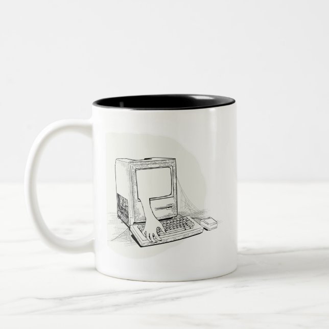 Le fantôme dans ma tasse "de Mac antique" de (Gauche)