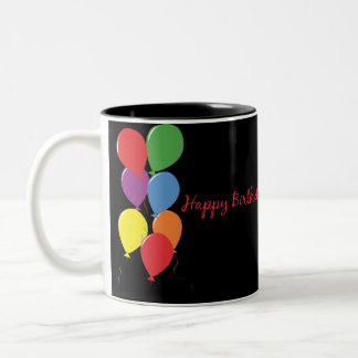 Le joyeux anniversaire monte en ballon la tasse de