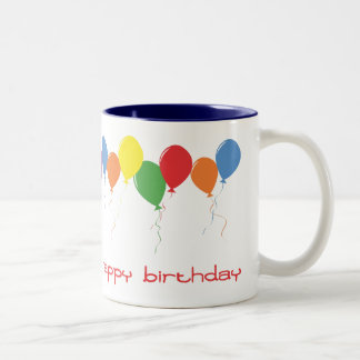 Le joyeux anniversaire monte en ballon la tasse de