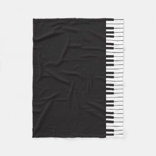 Le piano verrouille la couverture d'ouatine