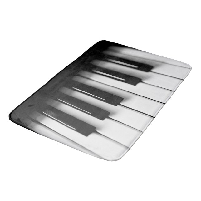 Le piano verrouille le tapis de bain (Angle)