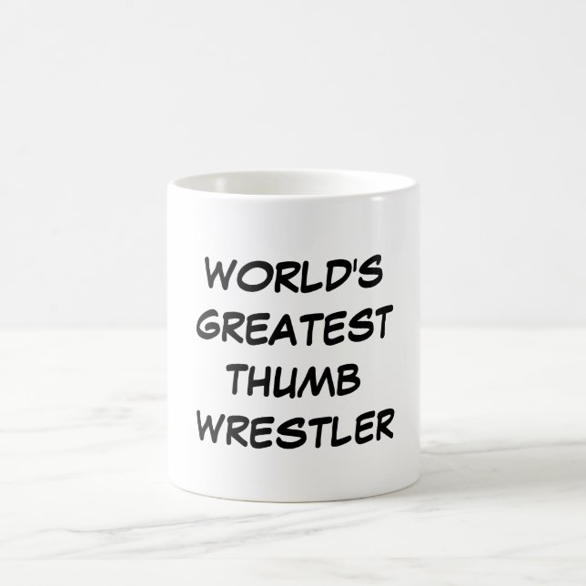 "Le plus grand lutteur de pouces du monde" Mug (Centre)