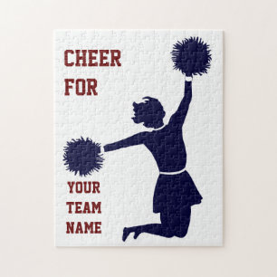 Le pom-pom girl en silhouette saute avec le puzzle