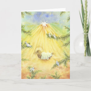 Le prêtre de Noël Jésus avec la carte Adoration Do