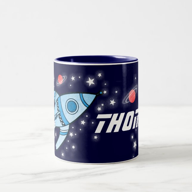 Le rouge bleu de fusée d'espace badine la tasse (Centre)