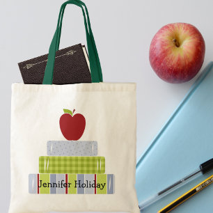 Le sac fourre-tout du professeur empilé de livres