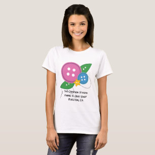 Le T-shirt de bouton de station de création