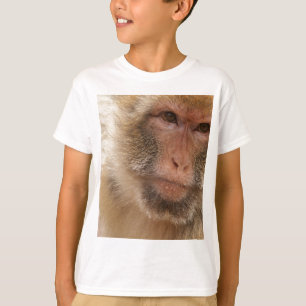 Le T-shirt de l'enfant de visage de singe