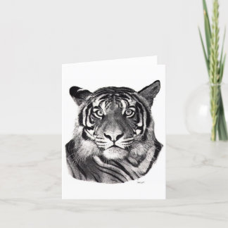 Le tigre observe la carte de note