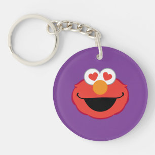 Le visage souriant d'Elmo avec les yeux en forme d
