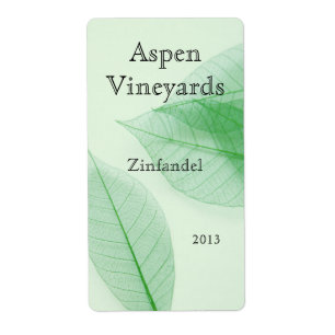 Leaf skeletons on pale green vertical wine label