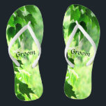 Leafy Wedding Groom Flip Flops<br><div class="desc">These Groom wedding flip flops invite you to enter a leafy summer world of nature. Maple leaves frame a sunny woodland forest scene with shades of yellow,  white and green.  Customize the text for your special occasion.</div>