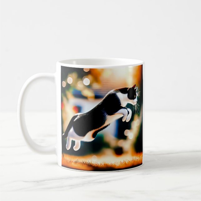 Leaping Black and White Cat Coffee Mug (Left)