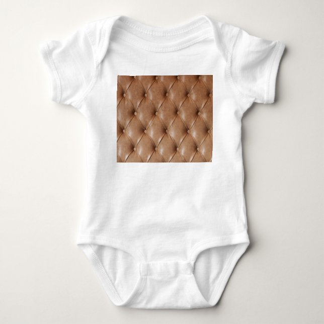 Leather Sofa: Textured Background Baby Bodysuit (Front)
