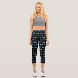 Leggings Capri Ailes d'angle brillant bleu sur arrière - plan noi