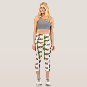 Leggings Capri Un mignon léopard dormant dans un arbre dessin ani