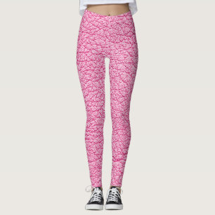 Leggings Cuir rose gros plan, arrière - plan texturé.