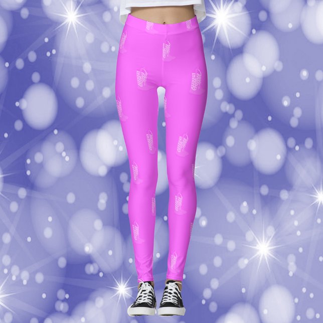 Leggings Étoiles de cowboy Boots Motif rose (A pair of leggings with a pink cowboy boot pattern)