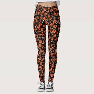 Leggings Fleurs orange vif sur un arrière - plan noir avec 