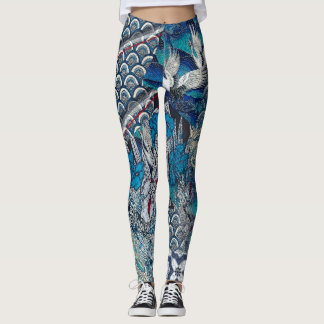 Leggings Grues bleues volant au-dessus des fleurs