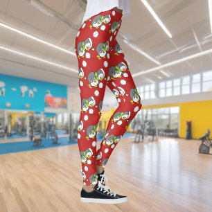 Leggings manchot de Noël ramassant une boule de neige