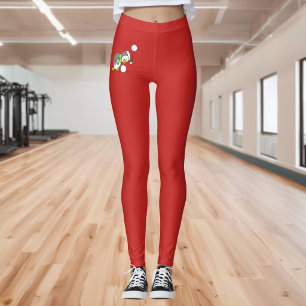 Leggings manchot de Noël ramassant une boule de neige