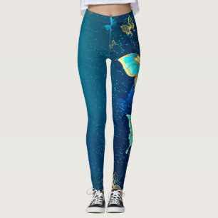 Leggings Papillons d'or sur un Arrière - plan bleu