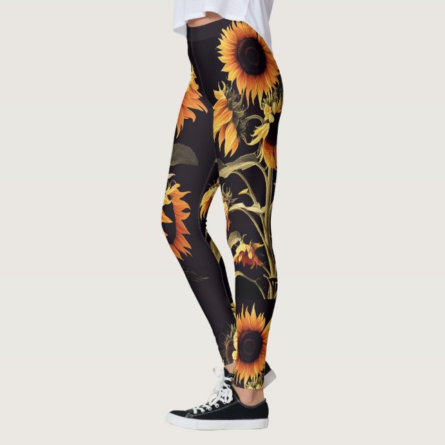 LEGGINGS SOUFFRANCES AVEC FEUILLES VERTS EN NOIR (Gauche)