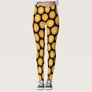 Leggings Tranches de fruit orange juteux cool sur fond noir