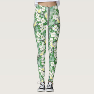 Leggings viréos de verdure sur le bois de chien à fleurs