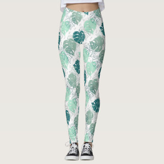Leggings with diagonal tropic leaf pattern