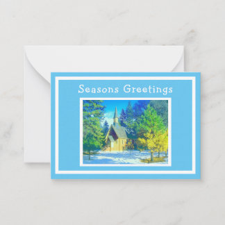L'église dans le paysage neigeux Carte de Noël