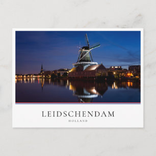 Leidschendam windmill with reflection at night postcard