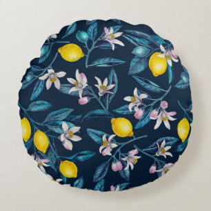Lemon branches with blossoms and fruit on blue round pillow