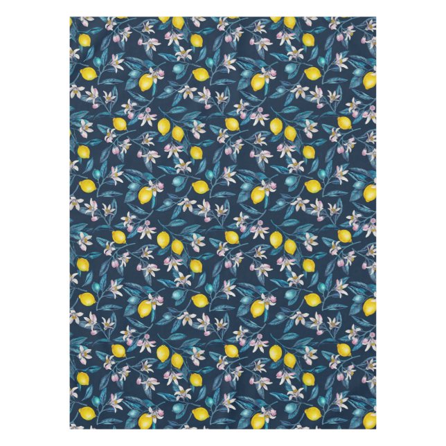 Lemon branches with blossoms and fruit on blue tablecloth (Front)