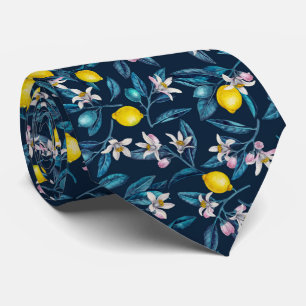Lemon branches with blossoms and fruit on blue tie