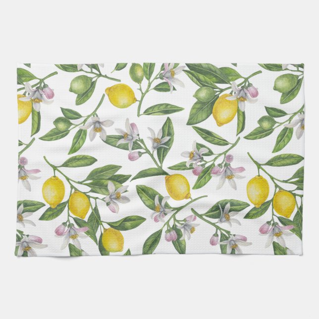 Lemon branches with blossoms and fruit on white kitchen towel (Horizontal)
