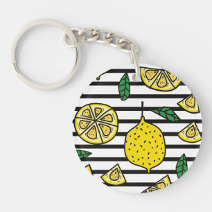 Lemon on Black and White Striped Background Keychain