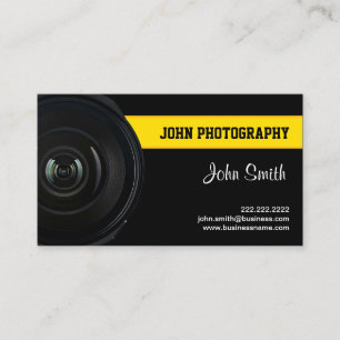 Lentille et carte de visite jaune de photographie