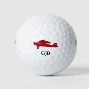 Les balles de golf de l'avion rouge Vintage