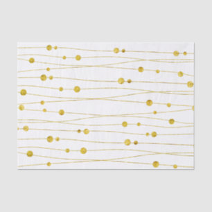 Les confettis d'or échouent le papier de soie de