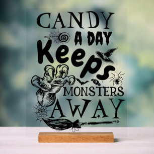 Les monstres de bonbons d'Halloween disent la fête