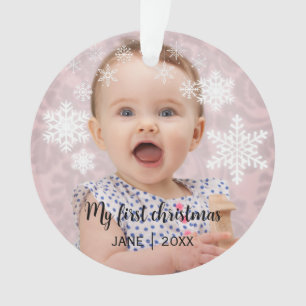 Les premiers flocons blancs de Noël du bébé