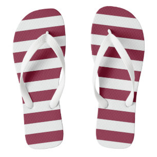 Les tongs de marron et de blanc