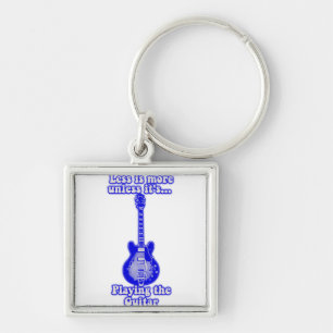 Less is more unless it's playing the guitar keychain