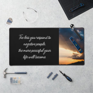 Less you respond to negative people sunset black desk mat
