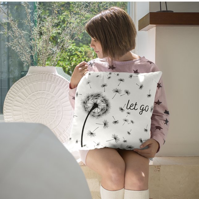 Let go, dandelion seed flowing in the wind throw pillow (Creator Uploaded)